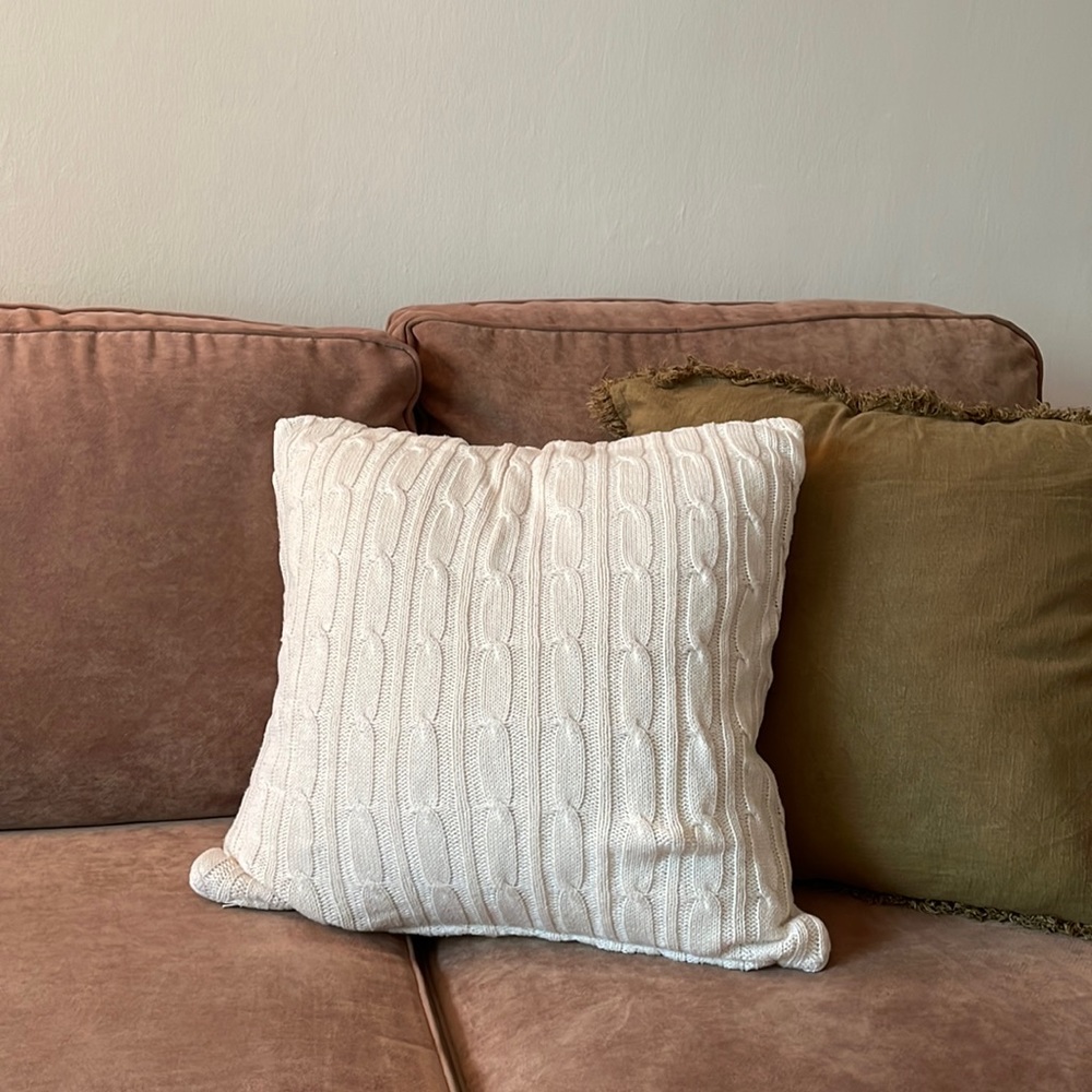 Two 20x20 cream sweater pillow covers